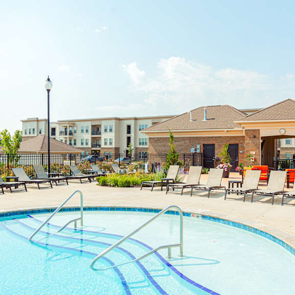 our apartments offer a swimming pool with chaise lounge chairs