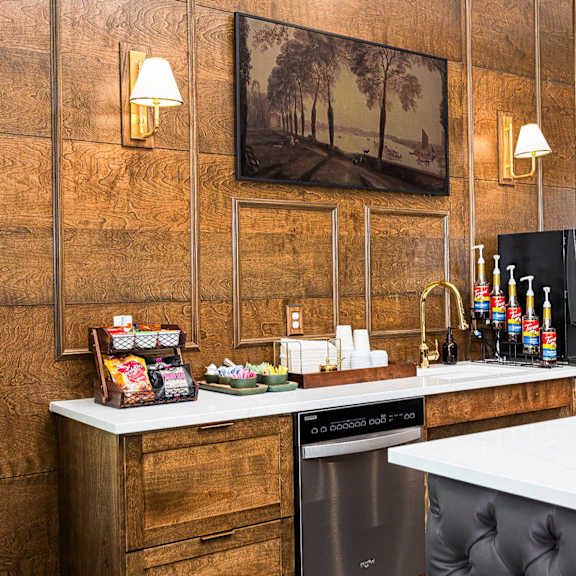 a kitchen with a counter top and a sink