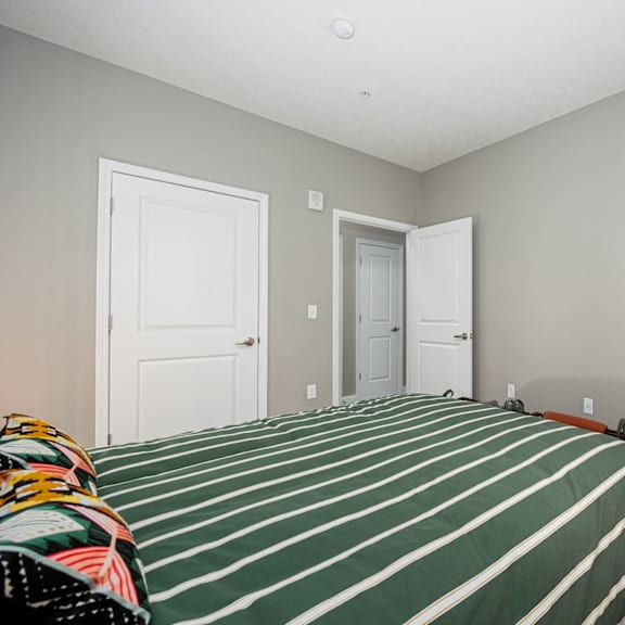 a bedroom with a bed