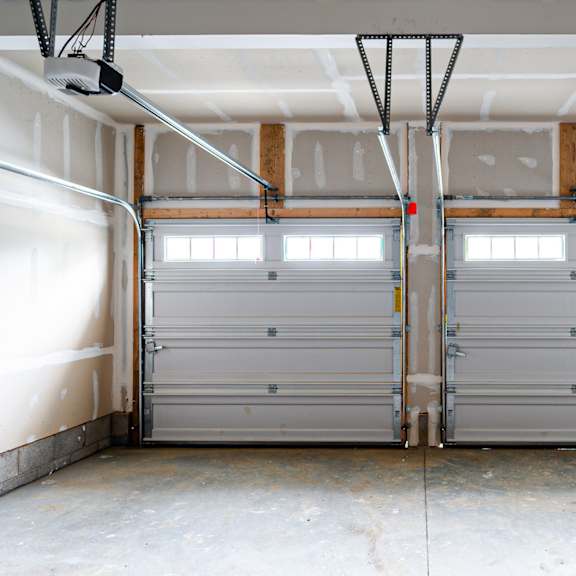 a pair of garage doors in a garage