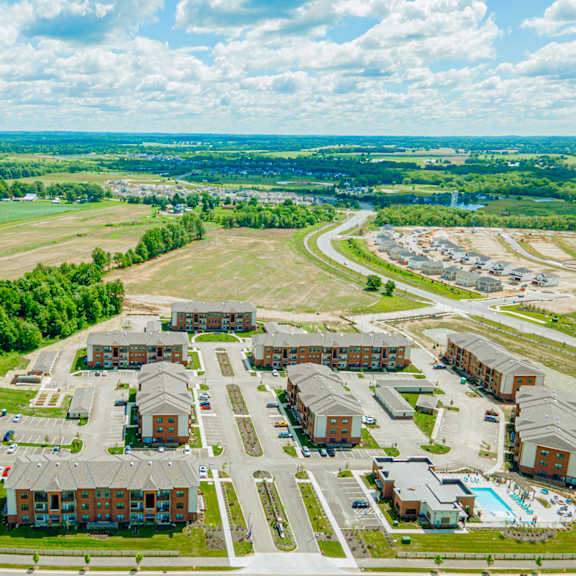 an aerial view of a building and an airport