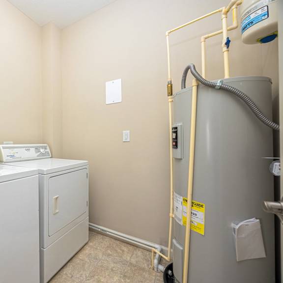 a laundry room with a washer and dryer.