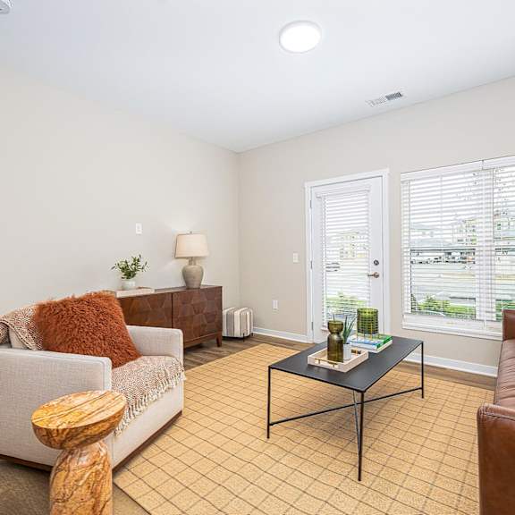 a living room with a couch and a coffee table