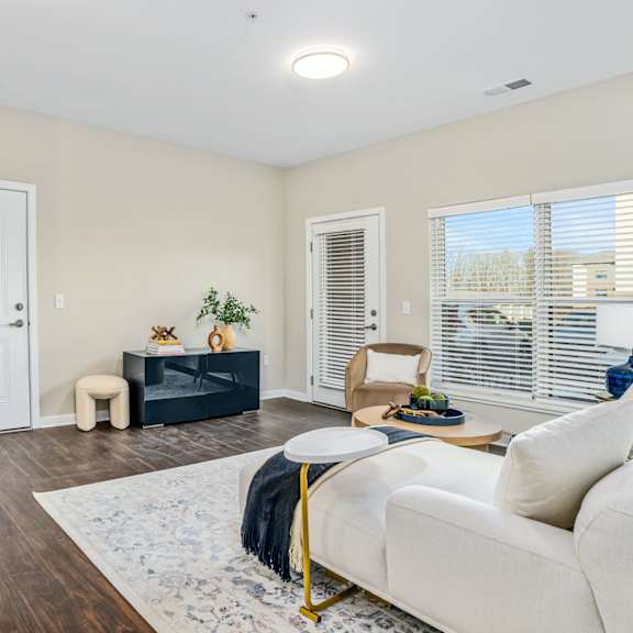 a living room with a couch and a table