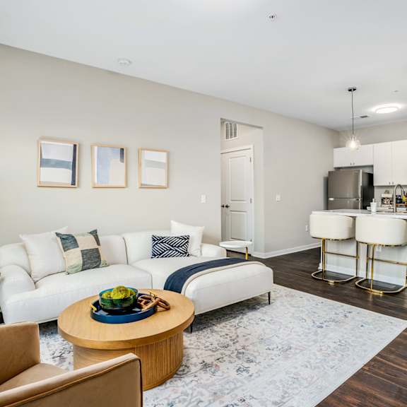 a living room with a couch and a table