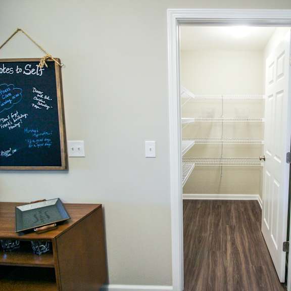a walk in closet in a 555 waverly unit
