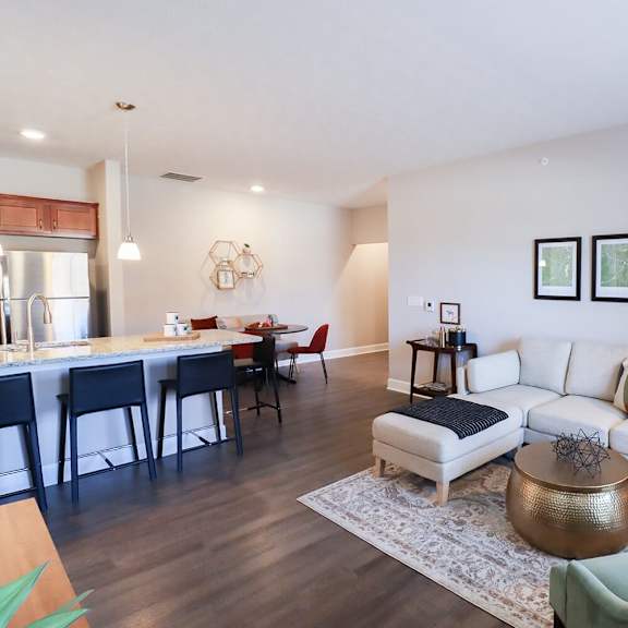 a living room with a couch and a table