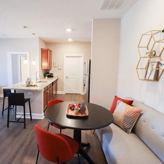 a living room with a couch and a table