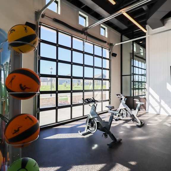 exercise equipment in the gym at the lofts at
