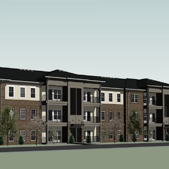 a large apartment building with multiple balconies and doors.