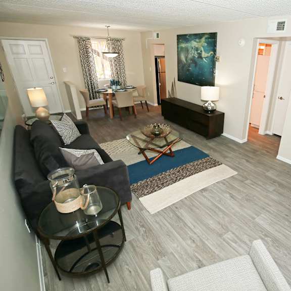 a living room with a couch and a table