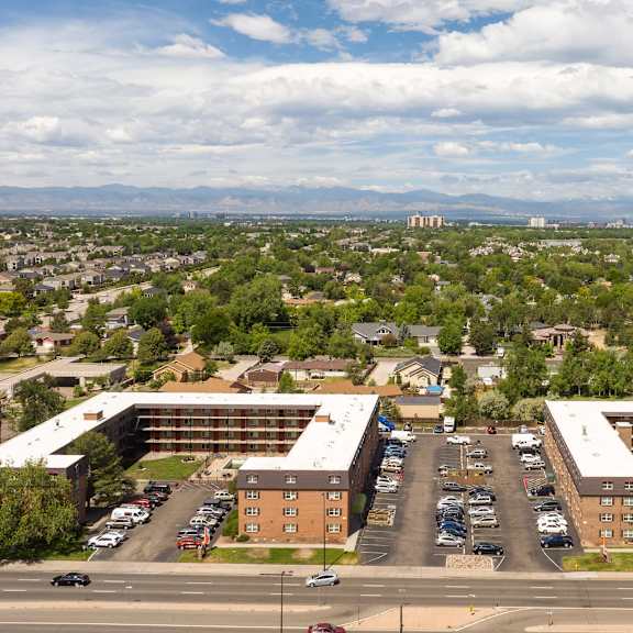 an aerial view of an office building and a parking lot