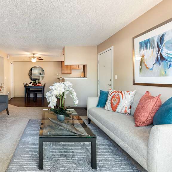 a living room with a couch and a coffee table