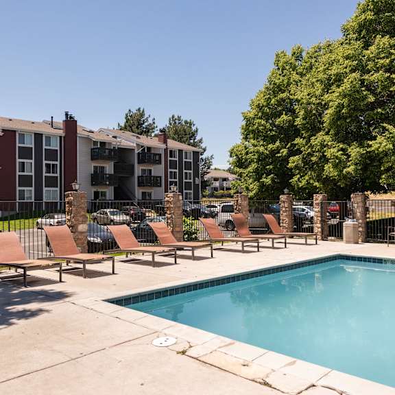 our apartments have a swimming pool with lounge chairs