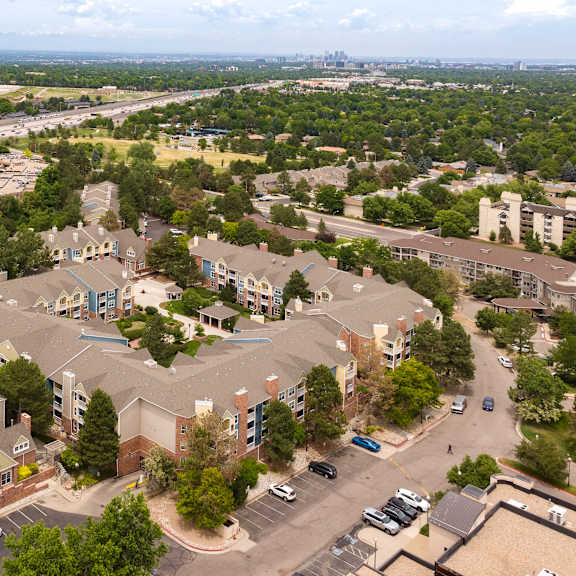 an aerial view of an empty parking lot in a city