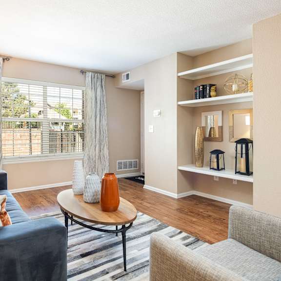 a living room with a couch and a table