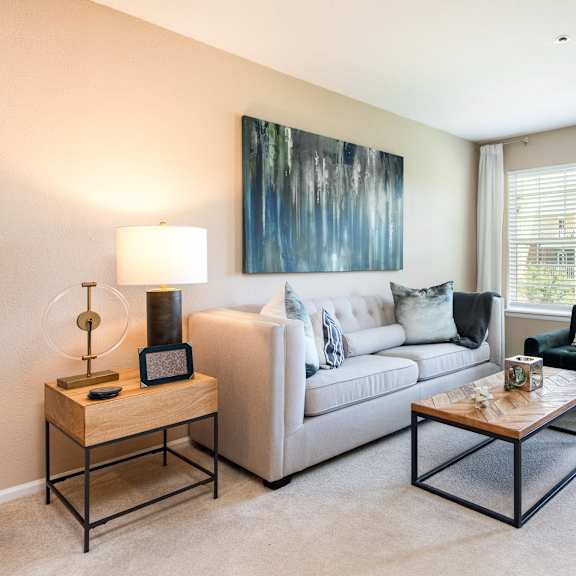 a living room with a couch and a coffee table