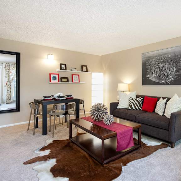 a living room with a couch and a table