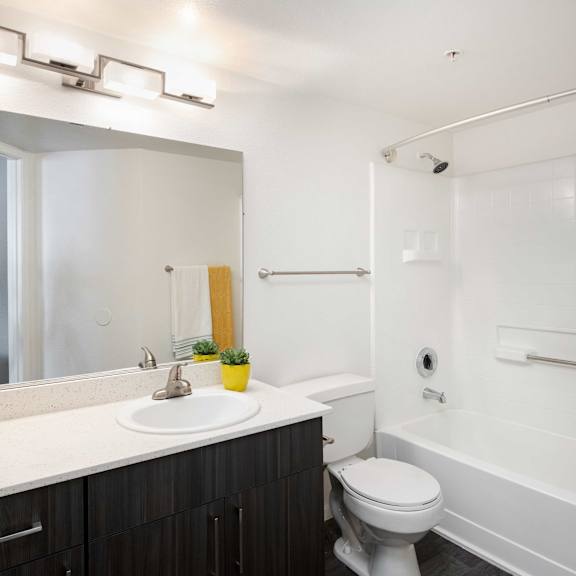 the preserve at ballantyne commons apartments bathroom with tub and sink