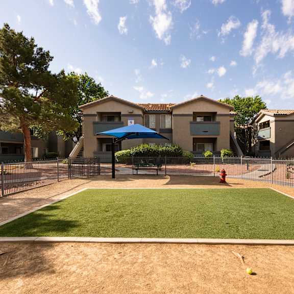 our apartments have a fenced in yard with a playground and a pool