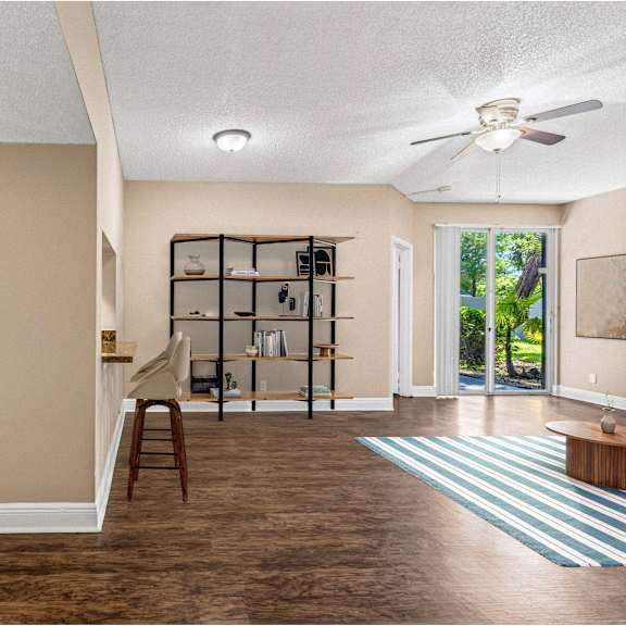 a kitchen with a refrigerator, oven, and microwave.