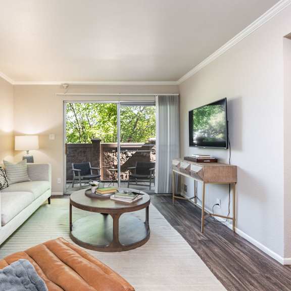 a living room with a couch and a table