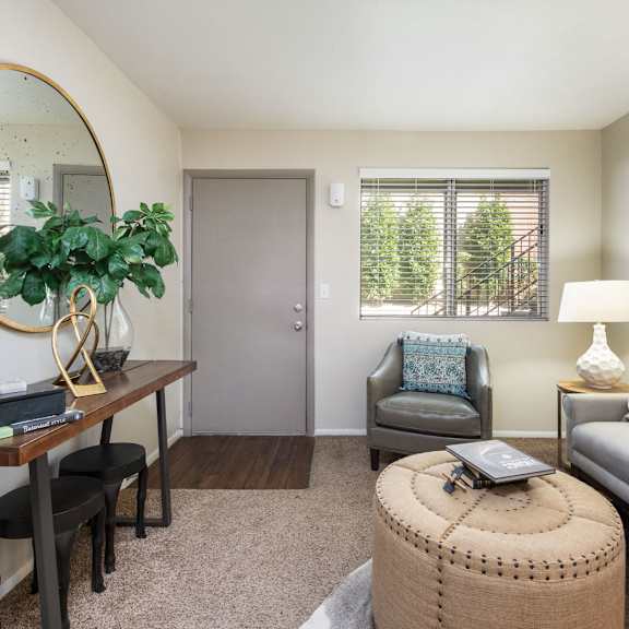 a living room with a couch and a table