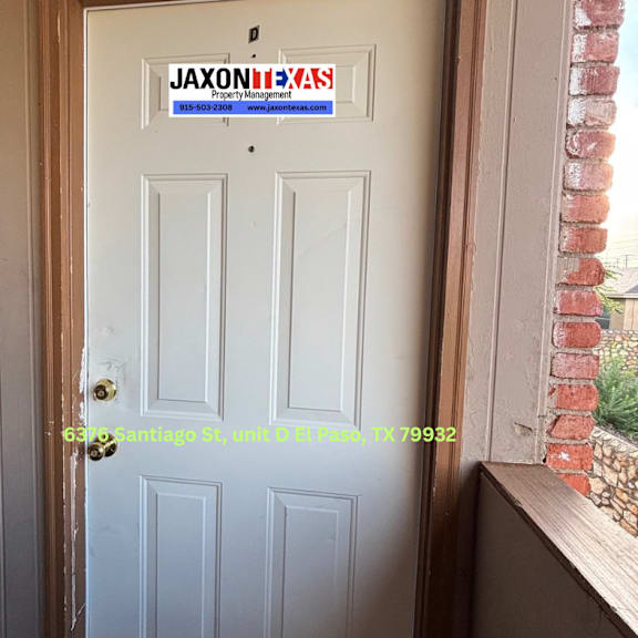 a white door with a sign that says jaxon management.