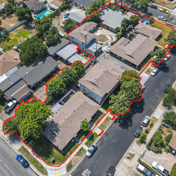 a red line outlines a section of a residential street.