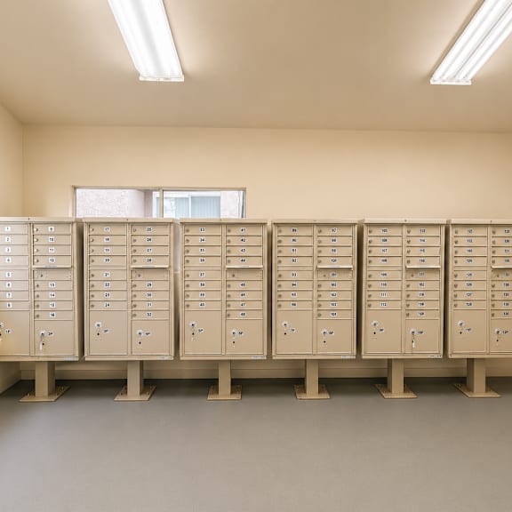 a row of filing cabinets in a room.