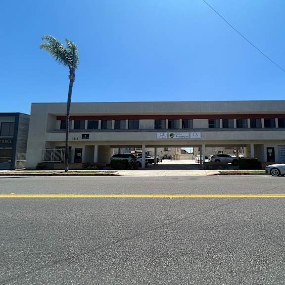 a building with a yellow line on the ground.