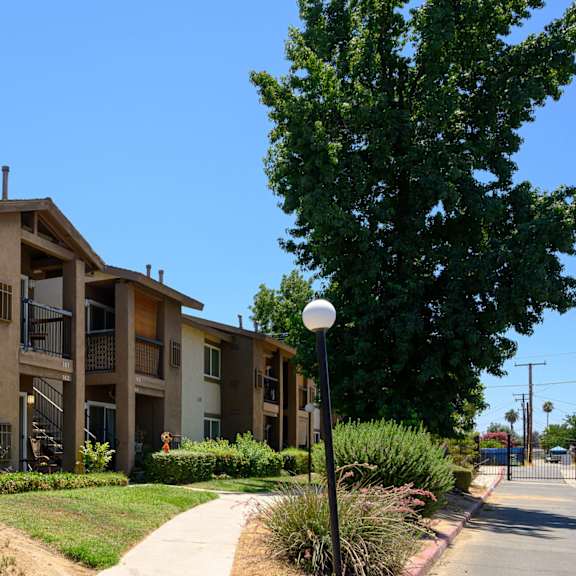 our apartments offer a walkway to the community at oak terrace senior apts, hemet, ca 92543