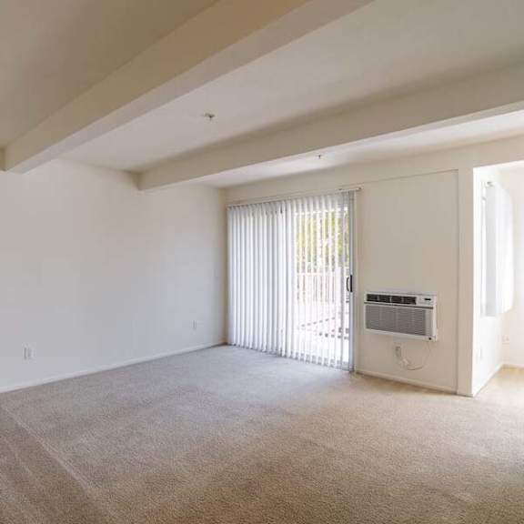 an empty room with a door and a window at mountainview venture, covina, 91722