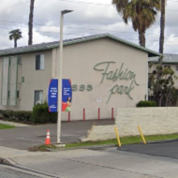 a building with a sign that says fashion park.
