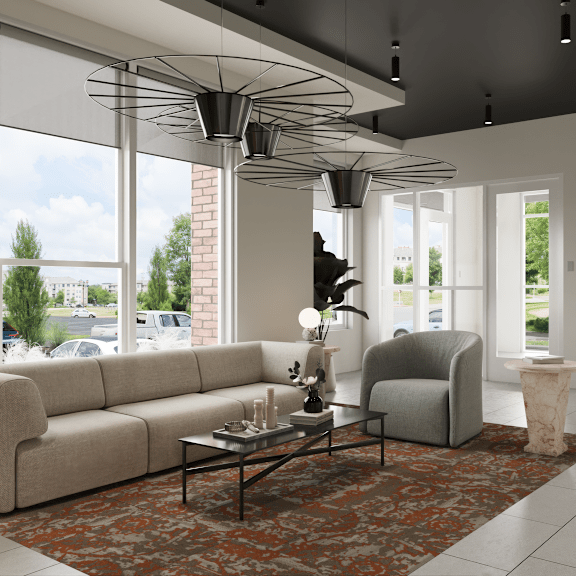 a modern living room with a large window and a view of trees and a building outside.