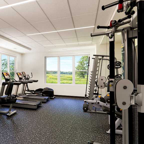 a well-equipped gym with a variety of exercise equipment.