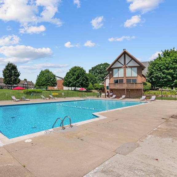 sparkling pool at residences at grand blanc apartments - grand blanc, mi, grand blanc twp, 48507