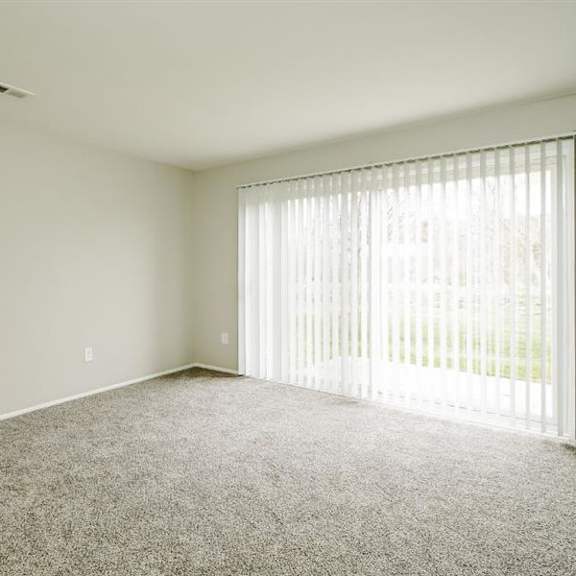 carpeted living area at residences at grand blanc apartments - grand blanc, mi, grand blanc twp, michigan