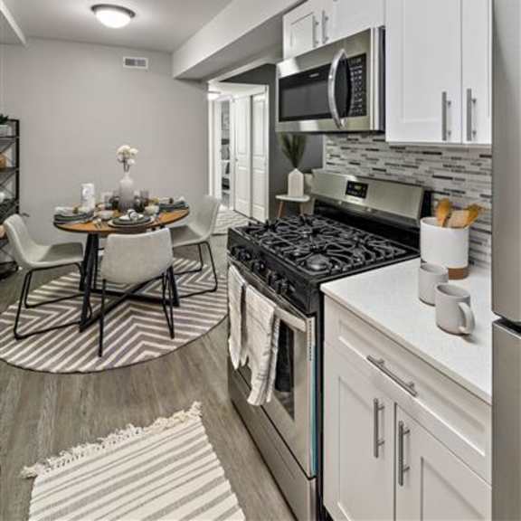 fully equipped kitchen at residences at grand blanc apartments - grand blanc, mi, michigan