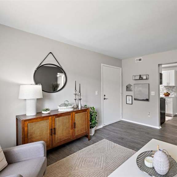 living room with kitchen at residences at grand blanc apartments - grand blanc, mi, grand blanc twp, michigan