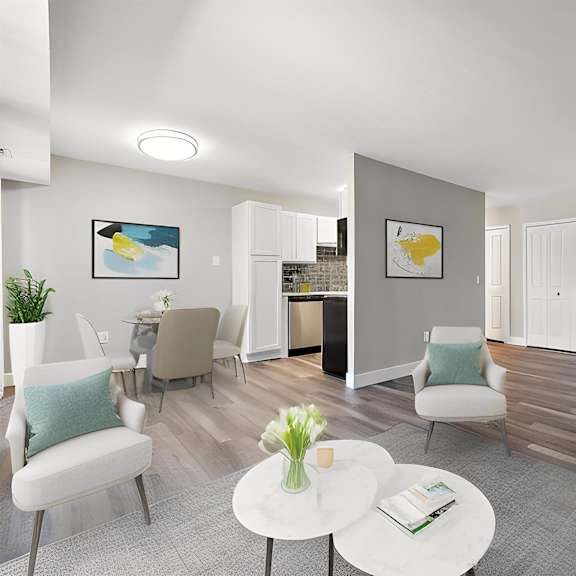 a living room with a couch and chairs and a table at sunnymede apartments - troy, mi, troy, michigan