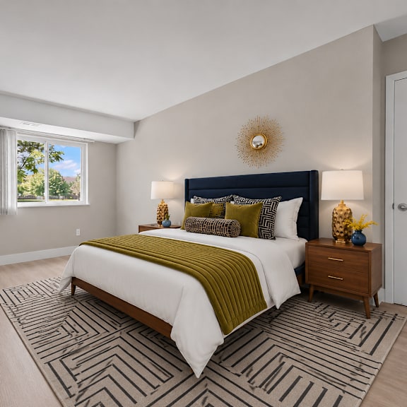 a bedroom with a large bed and a wooden dresser.