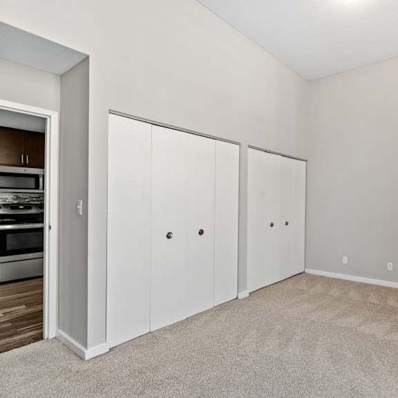 Thumbnail 7 of 12 Room with a carpeted floor and a wall-mounted air vent at The Cosmopolitan, St Paul, MN, Minnesota, 55101