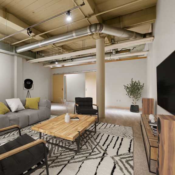 Thumbnail 12 of 13 Downstairs living area or den. Lowertown Lofts  in St. Paul, MN 3 Bedroom 2.5 Bath Plus Den Apartment  at Lowertown Lofts, Minnesota