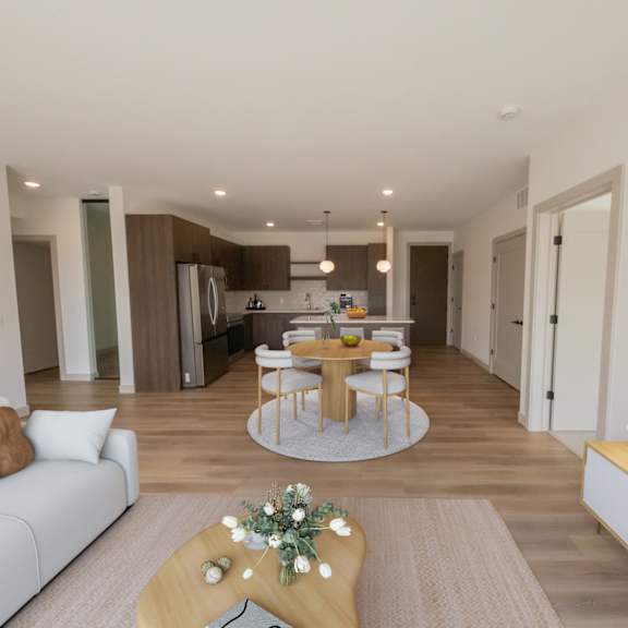 Thumbnail 3 of 10 Living room, kitchen, and dining area in the CC3 two bedroom plus den, two bathroom floor plan at The Mera in St. Louis Park, Minnesota