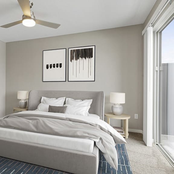 Thumbnail 11 of 15 Bedroom with bed, ceiling fan and light at Nuvelo at Parkside, Apple Valley, MN