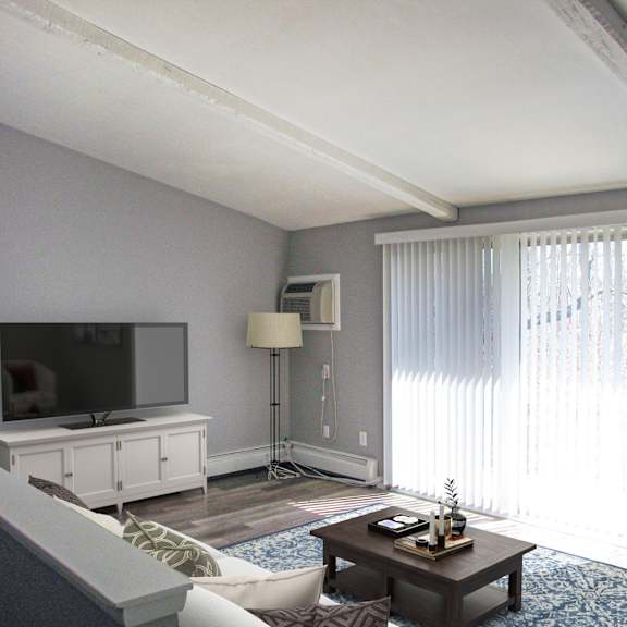 a living room with a television, a couch, a coffee table, and a painting on the wall.