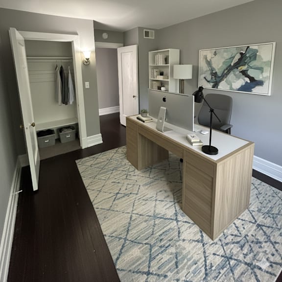 a room with a desk and a chair.