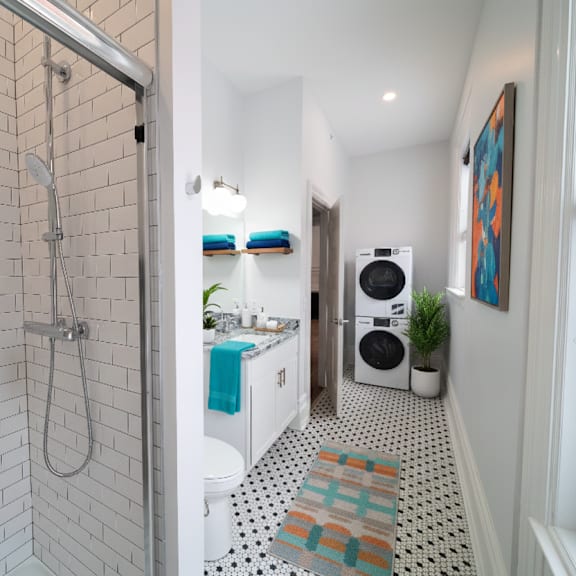 a bathroom with a shower and a sink.