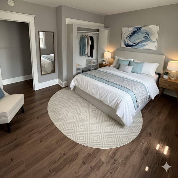 a bedroom with a round bed and a mirror on the wall.